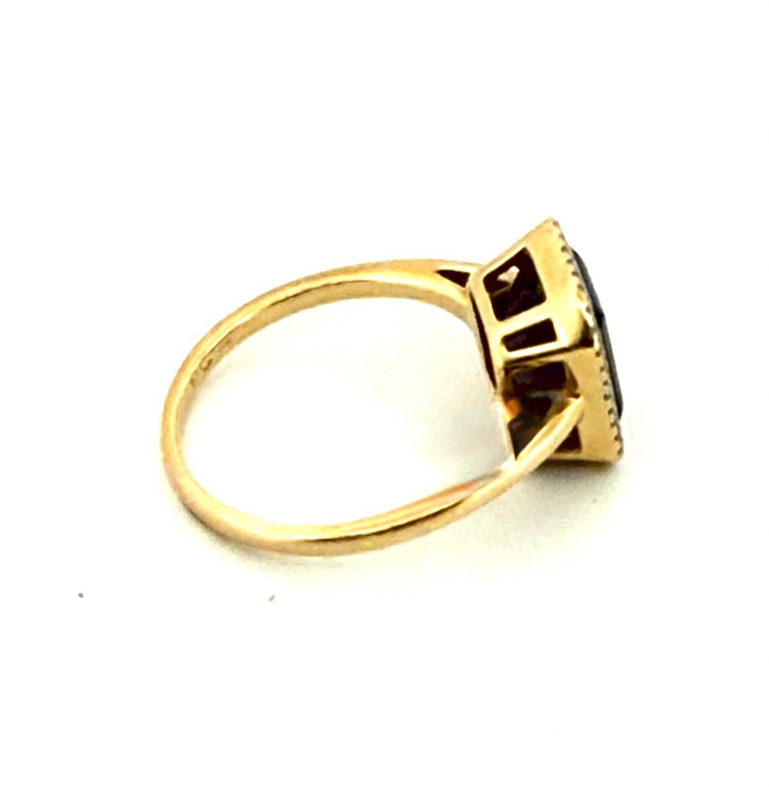 Anillo de oro con amatista y diamantes