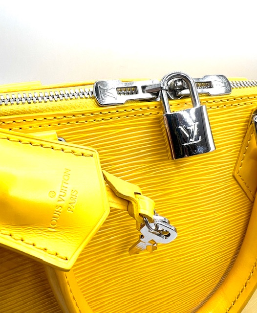 Bolso Alma Louis Vuitton GM epi amarilla