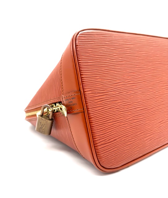 Bolso de mano, Louis Vuitton Alma de cuero Epi naranja.