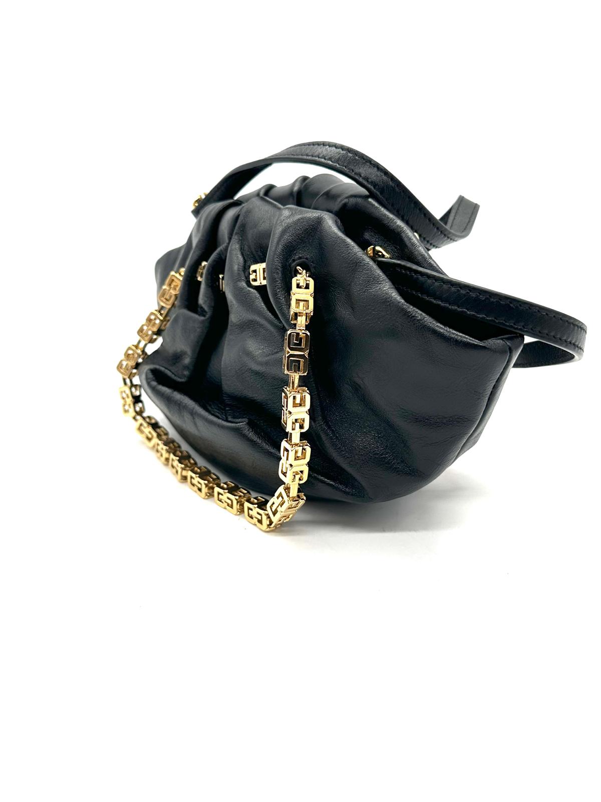 Bolso Givenchy con candado dorado y bandolera