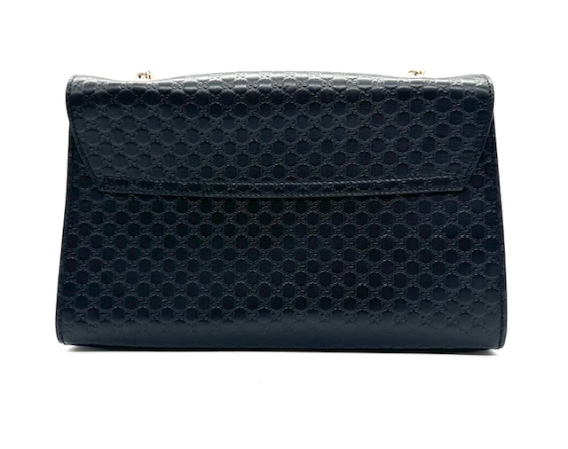Bolso Gucci Emily de cuero negro.