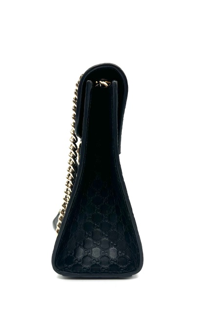 Bolso Gucci Emily de cuero negro.