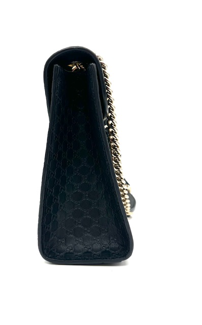 Bolso Gucci Emily de cuero negro.