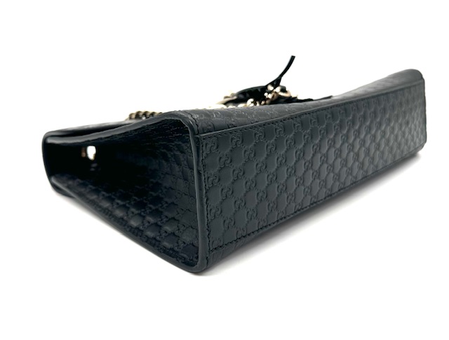 Bolso Gucci Emily de cuero negro.