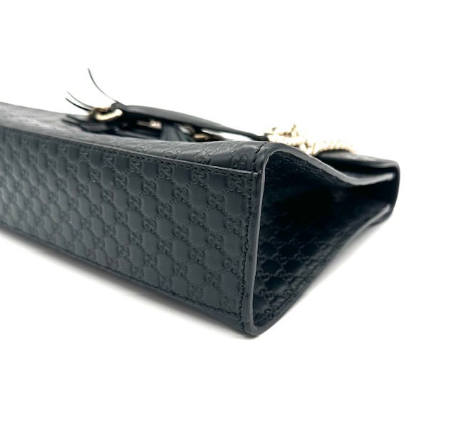 Bolso Gucci Emily de cuero negro.