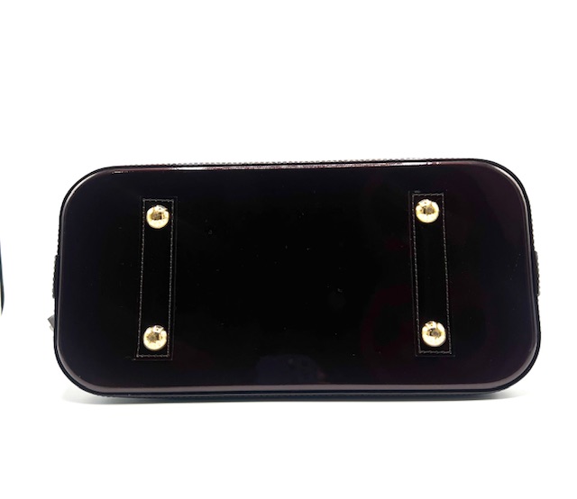 Bolso Louis Vuitton Alma PM en charol color amaranto