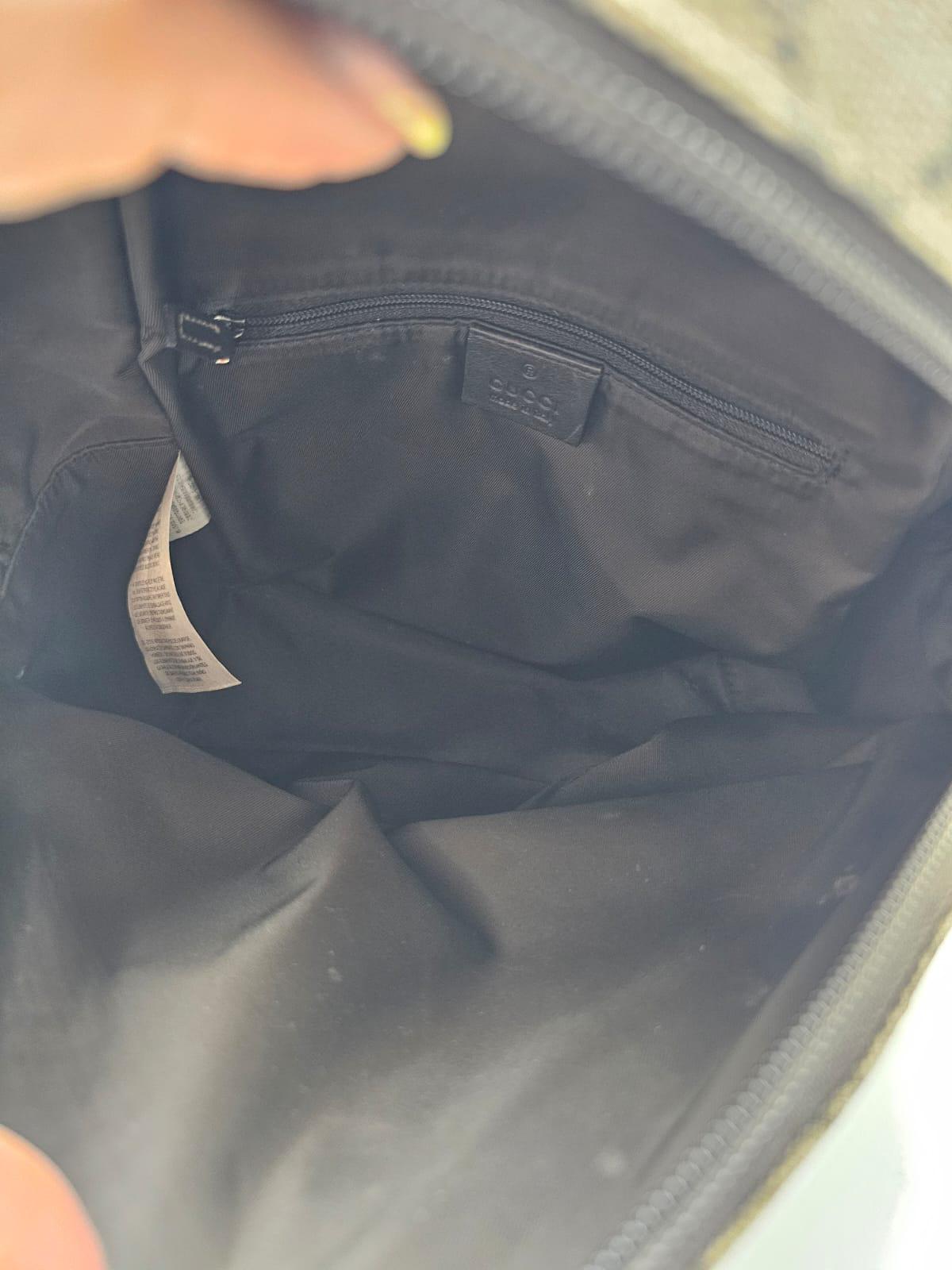 mochila Gucci GG Supreme