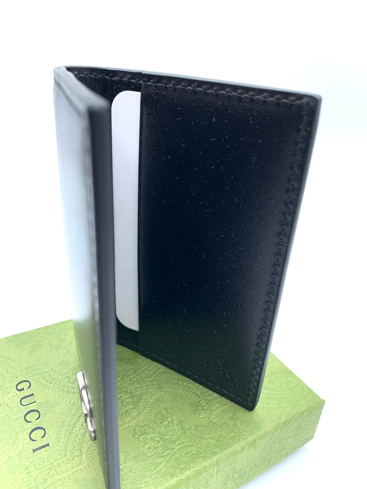 cartera gucci cuero negro sin uso