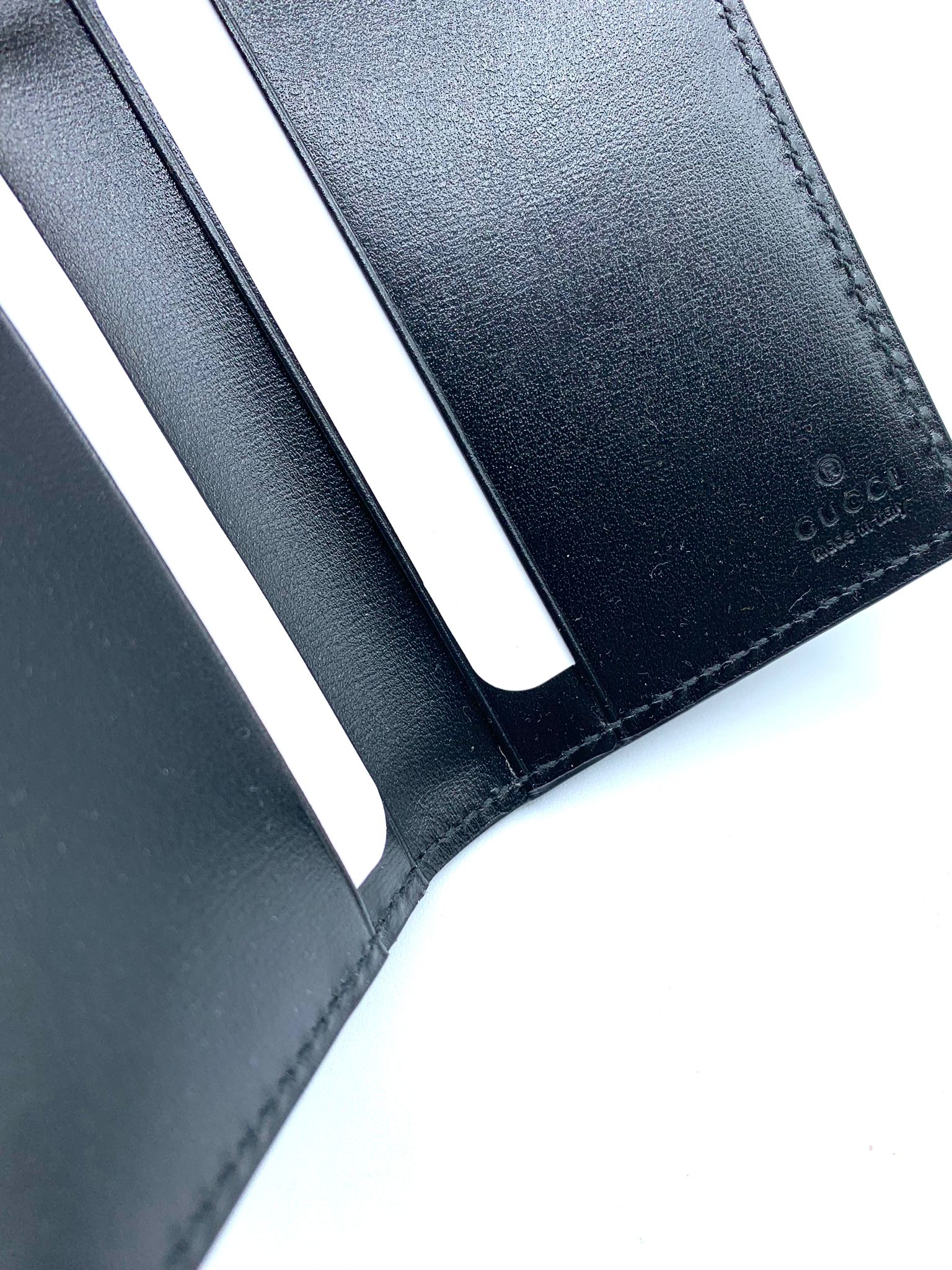 cartera gucci cuero negro sin uso