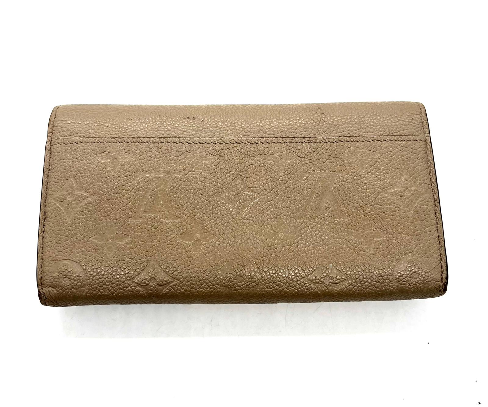 Cartera monogram cuero Louis Vuitton