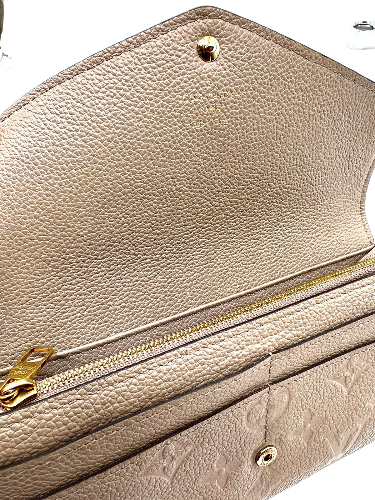 Cartera monogram cuero Louis Vuitton