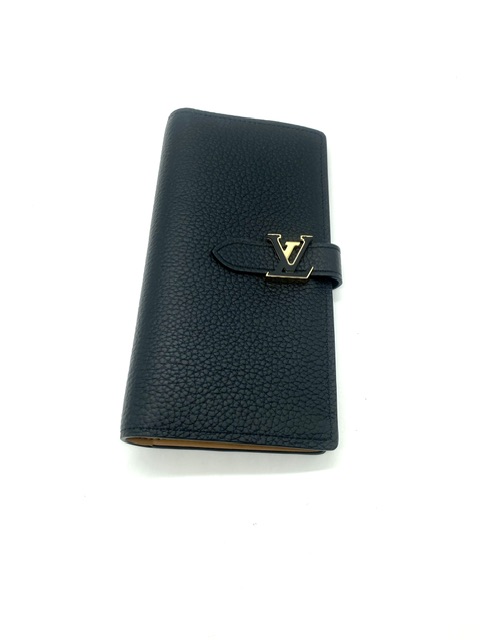 cartera Vertical Noir Horizon de Louis Vuitton
