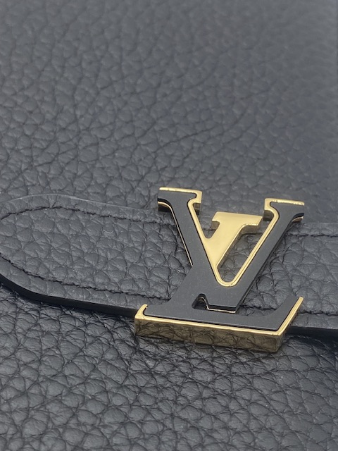 cartera Vertical Noir Horizon de Louis Vuitton