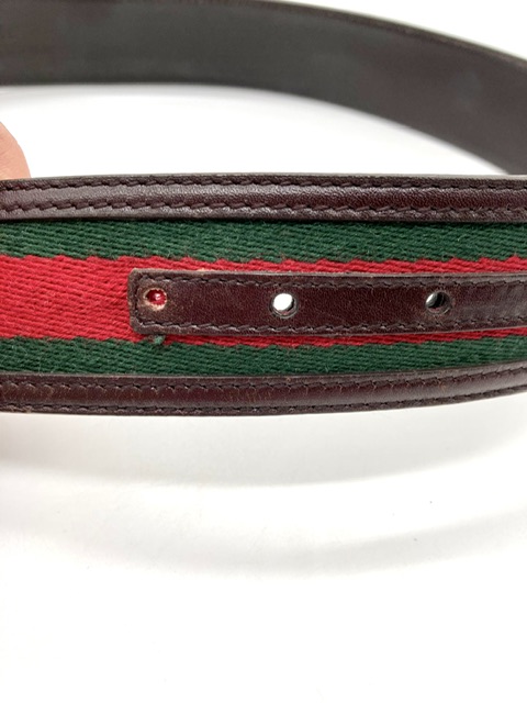 Cinturón Gucci cuero y tejido verde y rojo