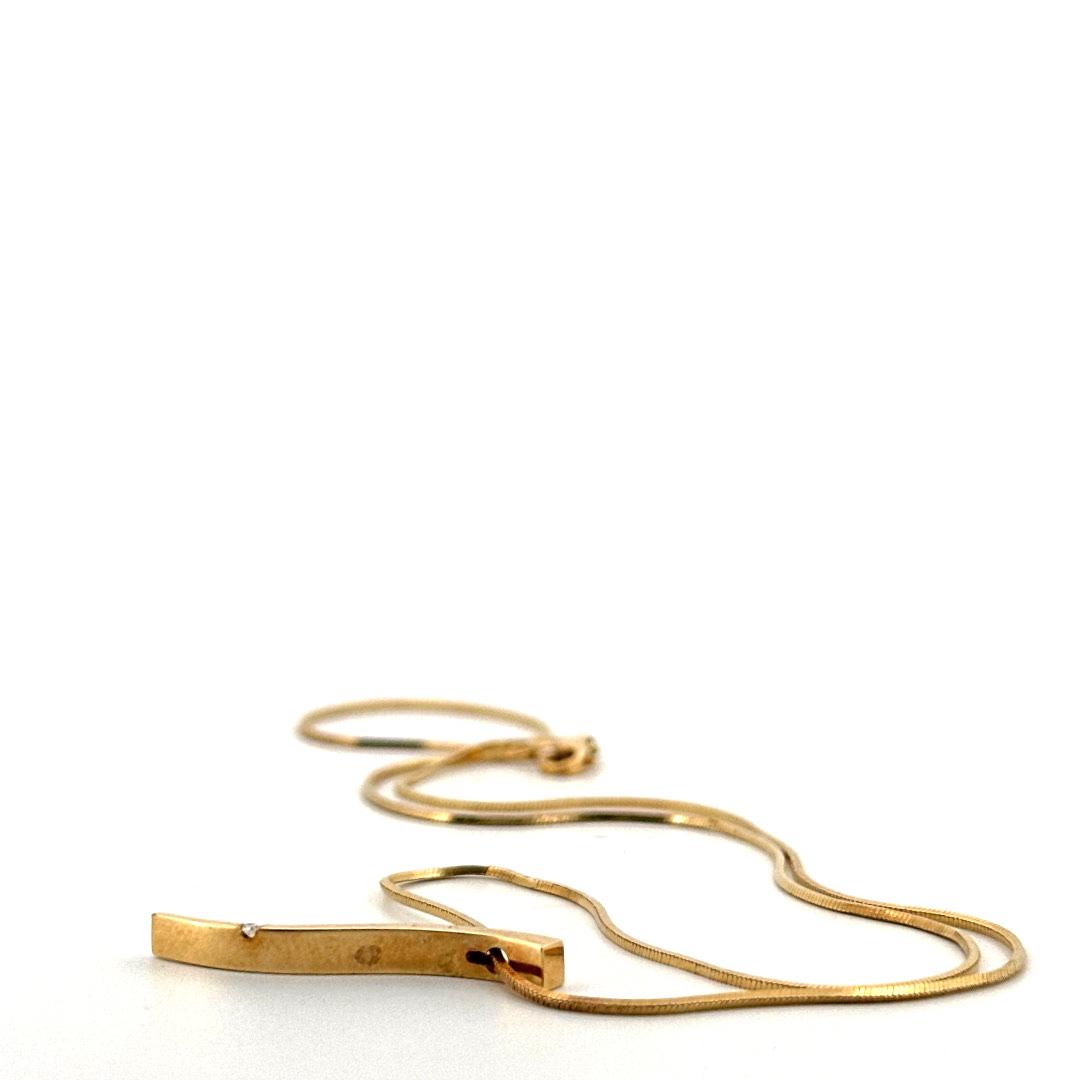 conjunto de pendientes y gargantilla de oro