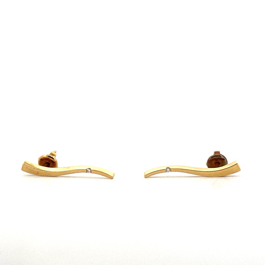conjunto de pendientes y gargantilla de oro