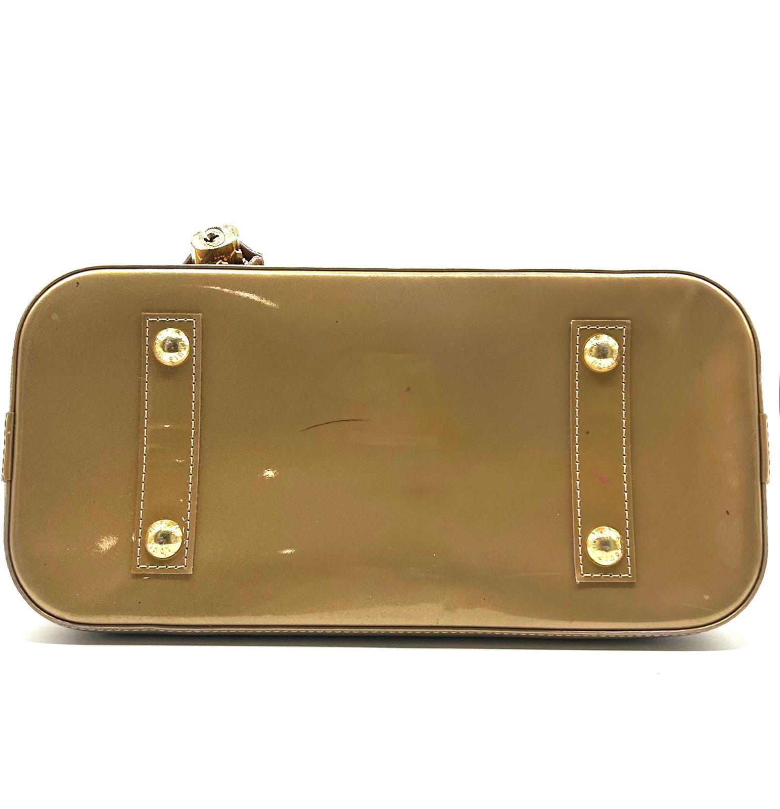 Louis Vuitton Alma PM Vernis dorado