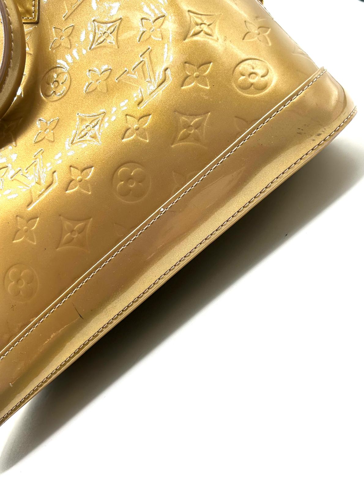 Louis Vuitton Alma PM Vernis dorado