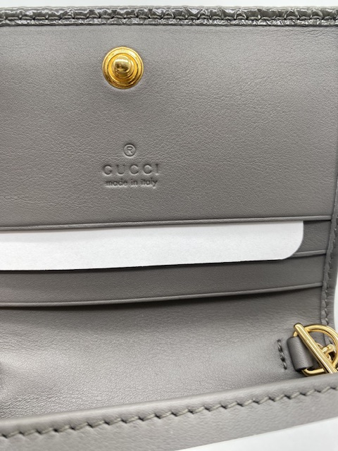 Monedero Zummy Gucci en piel de serpiente