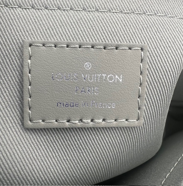 Pochette de viaje Souple Louis Vuitton
