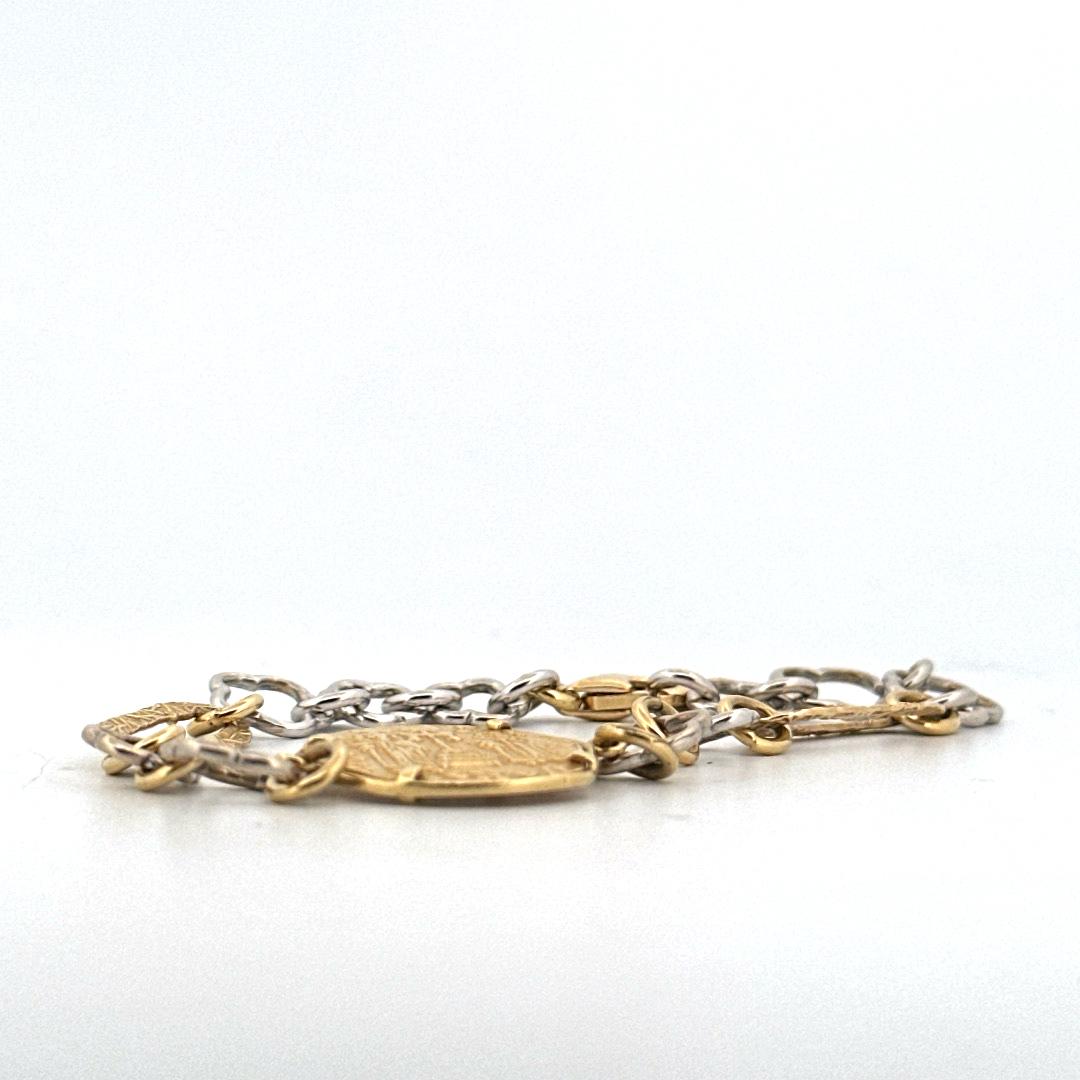 pulsera fabricada en oro y plata