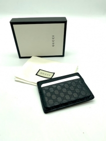 Card holder Gucci en cuero labrado negro | Gucci
