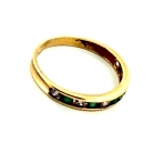 Gold ring with emeralds and diamonds