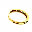 Gold ring with emeralds and diamonds