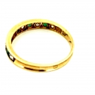 Gold ring with emeralds and diamonds