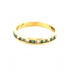 Gold ring with emeralds and diamonds