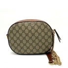 Bandolera monogram Gucci en lona