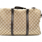 Bolsa de viaje Gucci GG supreme.