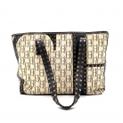 Bolso Carolina Herrera, combinado en cuero marron y tejido icónico de Carolina Herrera.