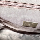 Bolso Carolina Herrera, combinado en cuero marron y tejido icónico de Carolina Herrera.