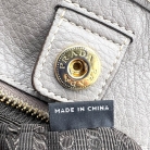 Prada – Borsa a spalla in pelle martellata