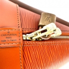 Bolso de mano, Louis Vuitton Alma de cuero Epi naranja.
