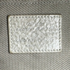 Louis Vuitton silver leather handbag with tassel