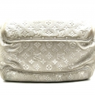 Louis Vuitton silver leather handbag with tassel
