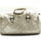 Louis Vuitton silver leather handbag with tassel
