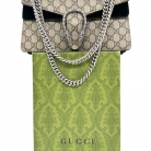 Bolso Dyonisus beige con estampado monogram y detalles de ante negro.