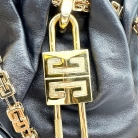 Bolso Givenchy con candado dorado y bandolera