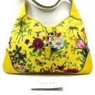 Bolso Gucci Jackie de la línea Flora amarilla