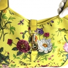 Bolso Gucci Jackie de la línea Flora amarilla