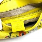 Bolso Gucci Jackie de la línea Flora amarilla