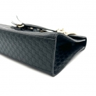 Bolso Gucci Emily de cuero negro.
