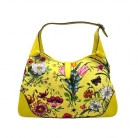 Bolso Gucci Jackie de la línea Flora amarilla