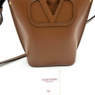 Valentino Garavani Small Bucket Crossbody Bag in Beige