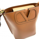 Valentino Garavani Small Bucket Crossbody Bag in Beige