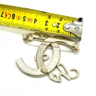 Chanel Coco brooch
