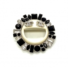 Chanel smiley emoji brooch